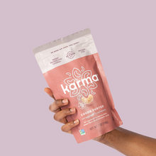 Load image into Gallery viewer, Karma Cocoa Dusted Wrapped Cashews