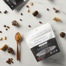 Load image into Gallery viewer, Espresso Energy Bites, espresso beans, and peanuts on marble.