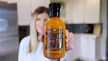 Load image into Gallery viewer, Blonde Beard’s Black Magic Buffalo Sauce bottle - 12 bottles x 8 oz case