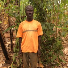 Load image into Gallery viewer, Partner Farmer, Gosbert on Nyanza Vanilla Farm in Tanzania from Burlap & Barre;