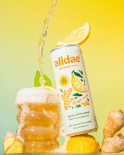 Load image into Gallery viewer, alldae superfruit soda Ginger Yuzu being poured into a glass. This is a healthy soda alternative with no added sugar or Stevia.