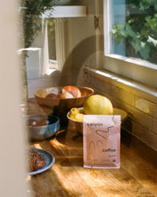 Load image into Gallery viewer, A bag of Gedeb Whole Bean coffee by Canyon Coffee with gold foil