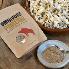 Load image into Gallery viewer, a bowl of popcorn with a 6 oz bag of Omnivore Porcini salt and a salt dish with a spoon and some porcini salt