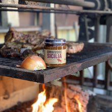 Load image into Gallery viewer, Organic sauce jar on grill
