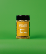 Load image into Gallery viewer, A side view of a bottle of Classic Herb SaladSprinkles showing ways to use the product. The label states flavorful, puffed rice sprinkles that add crunch to your salad, pasta, veggies, even ice cream! #NoMoreCroutons