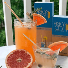Load image into Gallery viewer, Tall and Short Cocktail alongside a tall and cocktail 100 count boxes of Holy City Straw Company wheat straws