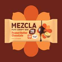 Load image into Gallery viewer, MEZCLA Puff-Crispy Bar in Peanut Butter Chocolate flavor, 11g protein, 170 calories, on orange flower background with chocolate drip design
