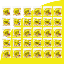 Load image into Gallery viewer, 30 Bjorn Qorn classic 1oz bags on yellow background.