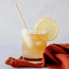 Load image into Gallery viewer, citrus chilled cocktail with tall wheat stem straw