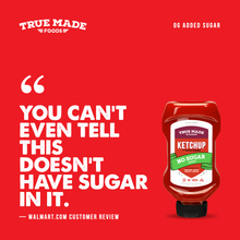Load image into Gallery viewer, A red promotional graphic for True Made Foods Ketchup No Sugar, featuring a squeeze bottle of ketchup on the right and large white text on the left with a customer review quote. The background is solid red.