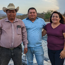 Load image into Gallery viewer, Emilio, Jonathan and Cecilia, who run the black lime drying facility in Alta Verapaz, Guatemala
