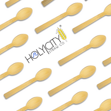 Load image into Gallery viewer, Holy City Straw Company wrapped bamboo spoons lined up on angle
