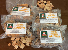 Load image into Gallery viewer, Flame Grilling Products Inc FOUR (6 OZ POUCHES) PRE-SOAKED MAINE HONEY WHISKEY MESQUITE WOOD CHIPS
