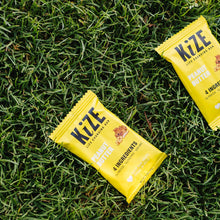Load image into Gallery viewer, Peanut Butter Kize Protein Bars in grass
