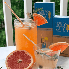 Load image into Gallery viewer, Tall and Short Cocktail alongside a tall and cocktail 100 count boxes of Holy City Straw Company wheat straws
