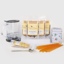 Load image into Gallery viewer, Plum Deluxe Tea Ultimate Hot Tea Bundle (Tea, Sweets, Scoop, Tin, and Tea Maker)
