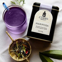 Load image into Gallery viewer, Photo of Mariposa tea with an image of brewed tea and a strainer of loose leaves
