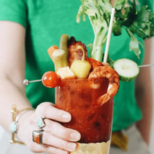 Load image into Gallery viewer, bloody mary with many garnishes and a tall wheat straw
