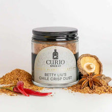 Load image into Gallery viewer, A glass jar of Betty Liu&#39;s Chile Crisp Dust, a collaboration spice blend with Betty Liu and Curio Spice.
