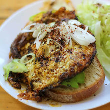 Load image into Gallery viewer, Korean BBQ spice rub sprinkled over a fried egg on avocado toast
