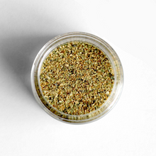 Load image into Gallery viewer, Curio Spice Co. Classic Blend Verano Lemon Pepper in a glass jar from above.
