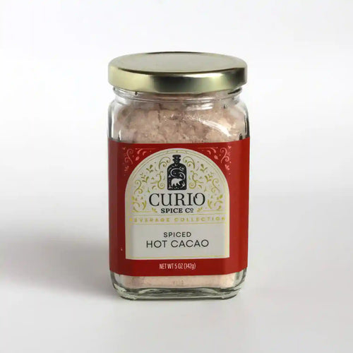 A glass jar of Spiced Hot Cacao