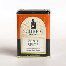 Load image into Gallery viewer, Orange and black tin of Zenú Spice, a Colombian-Inspired Fruit &amp; Spice Blend from Curio&#39;s Signature Blend collection.

