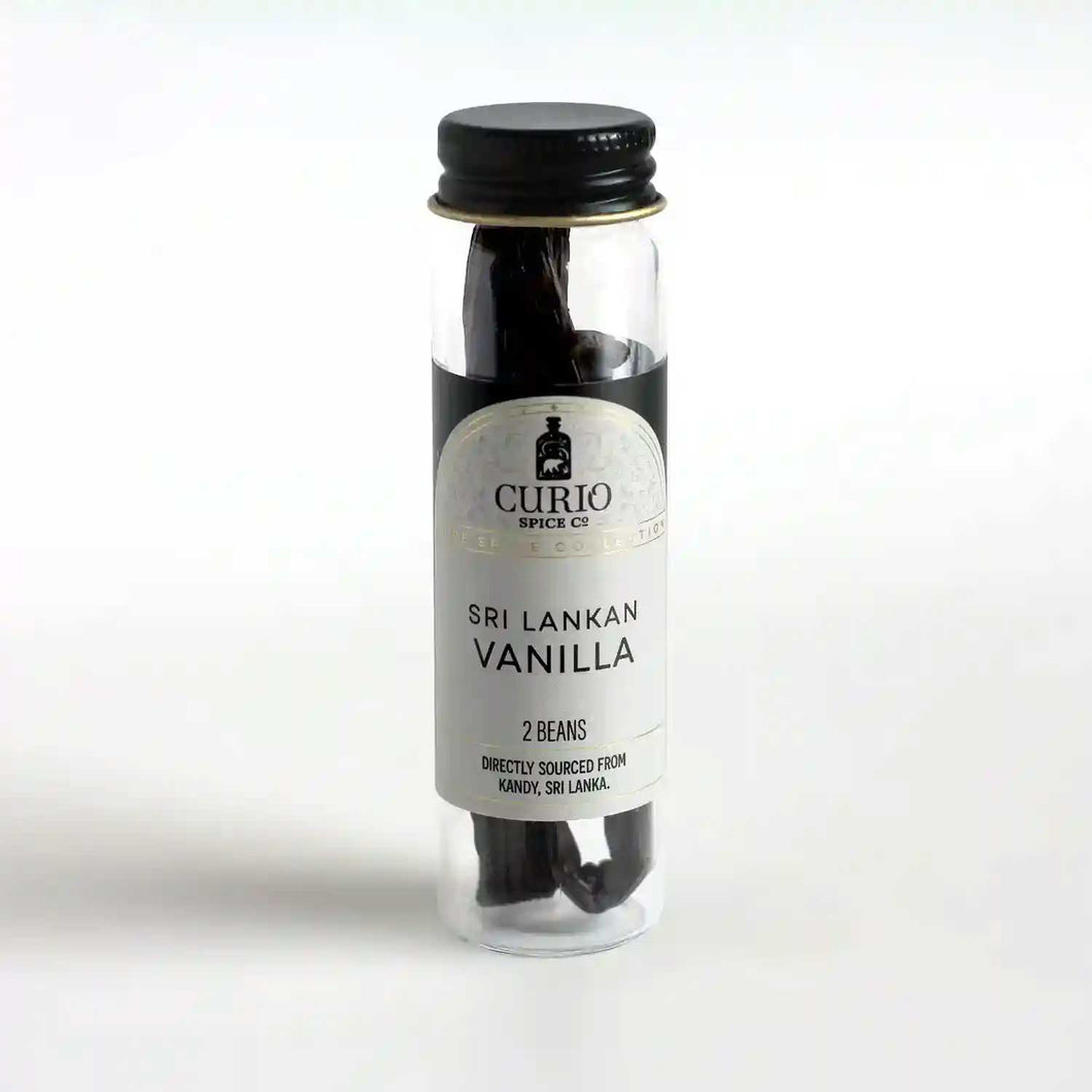 Slim glass jar of Sri Lankan Vanilla beans.