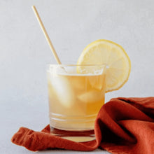 Load image into Gallery viewer, iced tea garnish with large lemon and wheat straw
