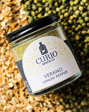 Load image into Gallery viewer, Curio Spice Co. Classic Blend Verano Lemon Pepper on a bed of green peppercorn and lemon peel.
