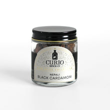 Load image into Gallery viewer, Curio Spice Co. fair-trade single origin sustainable Nepali black cardamom pods in a glass jar.
