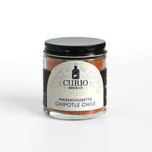 Load image into Gallery viewer, Curio Spice Co. fair-trade single origin sustainable Massachusetts ground chipotle chilies in a glass jar.
