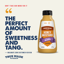 Load image into Gallery viewer, A bottle of True Made Foods Keto Honey Mustard with real honey, shown on the right against a light cream background with large promotional text and a customer review quote on the left.
