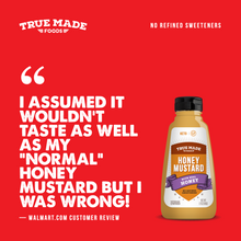 Load image into Gallery viewer, A promotional graphic for a bottle of True Made Foods Honey Mustard on a bright red background, with a large customer review quote in white text and the True Made Foods logo in the top left.
