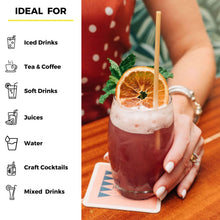 Load image into Gallery viewer, spike punch cocktail with orange and wheat stem straw
