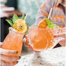 Load image into Gallery viewer, Two hands cheersing island cocktail with wheat straw
