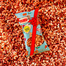 Load image into Gallery viewer, Front of Ruby bag on a pile of Ruby popcorn
